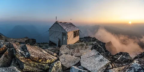 Hidden Peak Fire Lookout At Sunset, With Smokey Haze From Nearby Fires