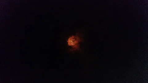 Solar Eclipse Through Man Shaped Cloud, August 21, 2017