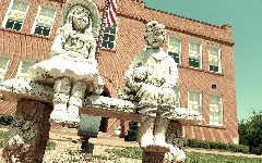 Children Statues Front Building