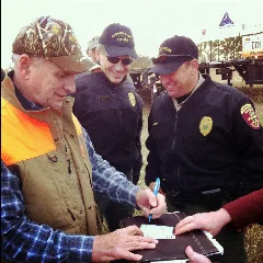 Governor Of Minnesota Governor Dayton Signs His 2012 Hunting License (8091197391)